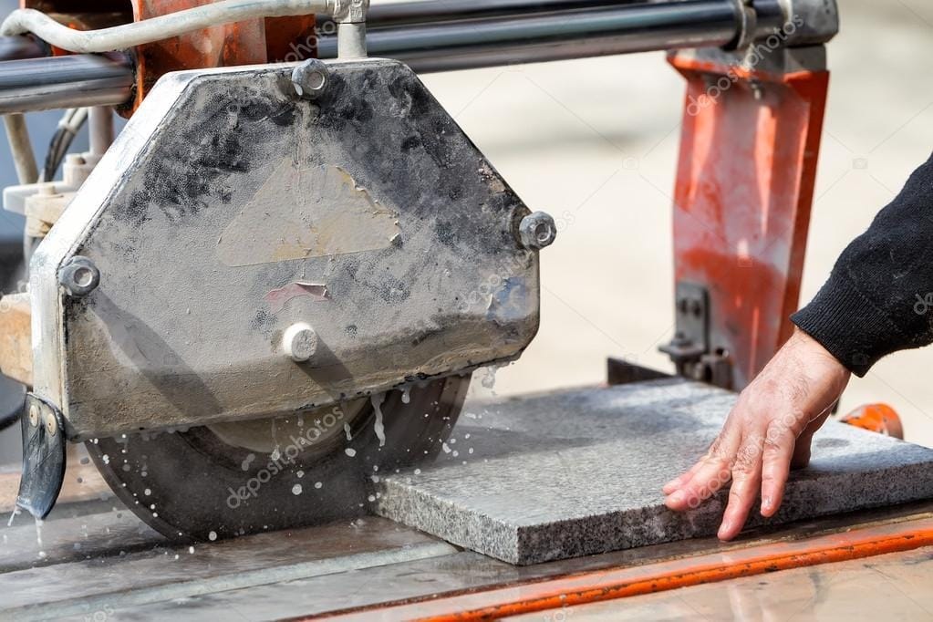 depositphotos_68308667-stock-photo-workers-are-working-cutting-marble.jpg